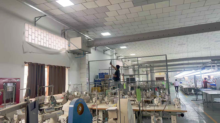 大型制衣廠區(qū)域降溫，應(yīng)用蒸發(fā)冷省電空調(diào)-臥式管道空調(diào)機(jī)組